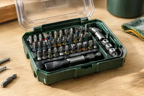 Coffret Stier ouvert avec embouts de vissage métalliques, porte-embouts magnétique et accessoires rangés